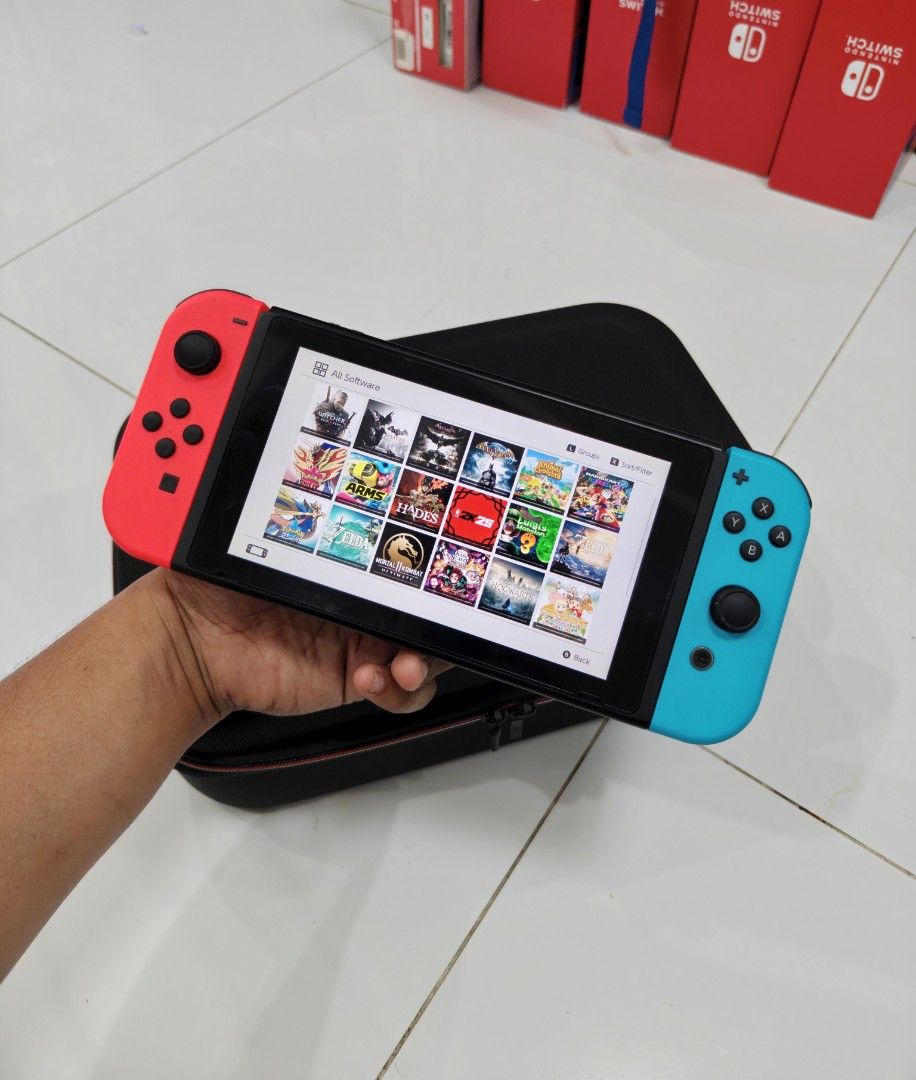 Nintendo Switch V1 with Free Game (Category: Nintendo) located in Manila. Submitted by nswitchgear (Listing ID 1446781998, Image 2). Description: Nintendo Switch V1 with Free Games ₱7,999 FREE acess to my Paid games Legit purchase not Jailbreak. Used item but in Good/Best condition Can give 7 Days personal Warranty for peace of mind. -Doon po tayo sa kaya tayong issupport, dont settle for less. Complete Package with Travelbag,Dock,charger,grips,s