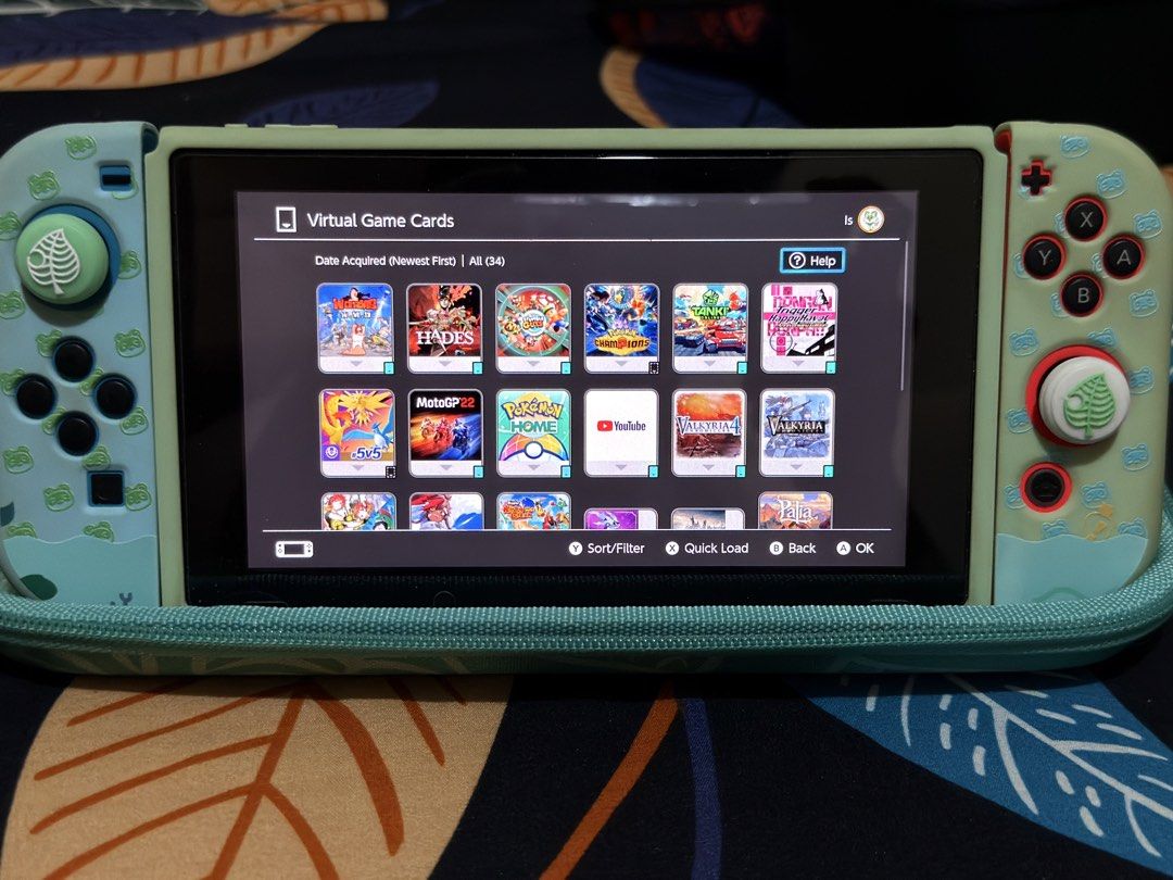Nintendo Switch V2 w/ 128GB SD Card (Category: Nintendo) located in Quezon City. Submitted by safedolphin.117802 (Listing ID 1446803191, Image 3). Description: Nintendo Switch v2 w/ 128GB SD Card Inclusions: Original Box Switch V2 console Dock HDMI cable Charger Animal Crossing Joy-Con skin and caps 2 carrying cases Digital Games (Primary) - Overcooked Eat All You Can! - Mortal Kombat 11 - Hades - God Eater 3 - 13 Sentinels Aegis Rim - Danganronp