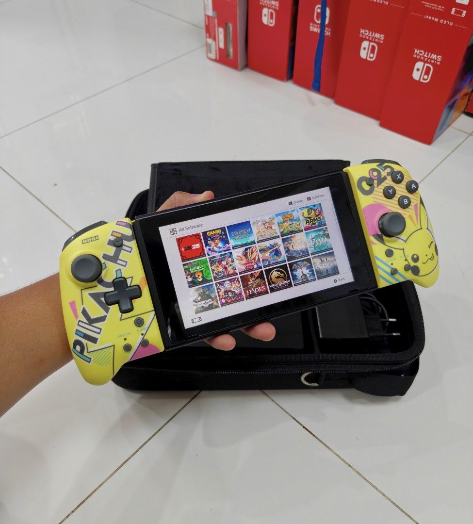 Nintendo Switch V2 with Free Games (Category: Nintendo) located in Manila. Submitted by nswitchgear (Listing ID 1446774313, Image 1). Description: Nintendo Switch V2 with Free Games ₱8,499 FREE acess to my Paid games Legit purchase not Jailbreak. Used item but in Good/Best condition Can give 7 Days personal Warranty for peace of mind. -Doon po tayo sa kaya tayong issupport, dont settle for less. Replace Joycon with Limited Pikachu Hori Splitpad(m