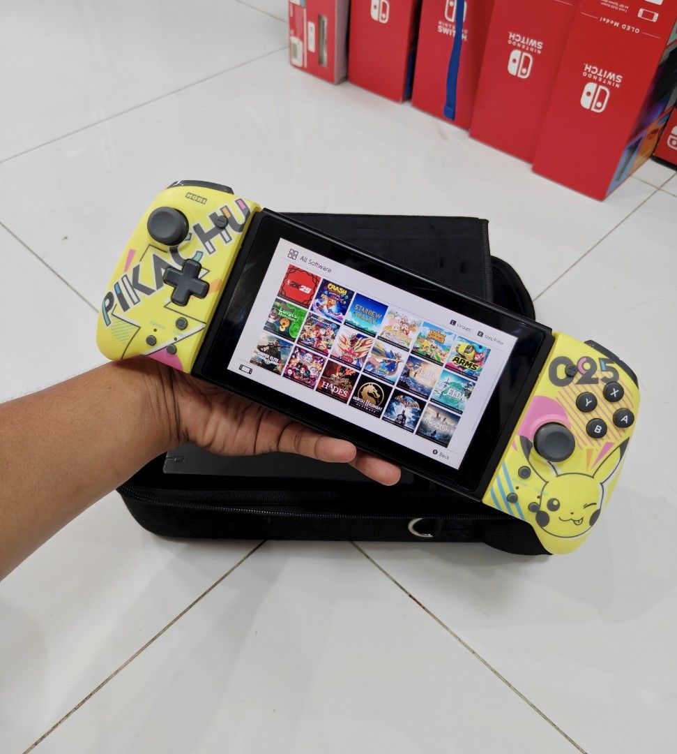 Nintendo Switch V2 with Free Games (Category: Nintendo) located in Manila. Submitted by nswitchgear (Listing ID 1446774313, Image 3). Description: Nintendo Switch V2 with Free Games ₱8,499 FREE acess to my Paid games Legit purchase not Jailbreak. Used item but in Good/Best condition Can give 7 Days personal Warranty for peace of mind. -Doon po tayo sa kaya tayong issupport, dont settle for less. Replace Joycon with Limited Pikachu Hori Splitpad(m