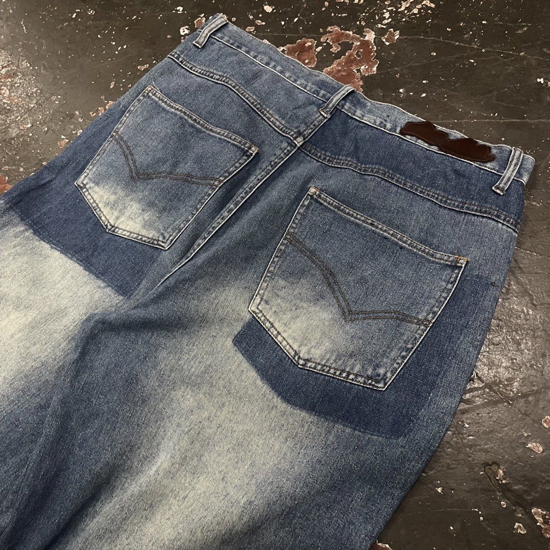 Pelle Pelle Patchwork Baggy Denim Jeans (Category: Jeans) located in Cagayan de Oro. Submitted by sumamestreethub (Listing ID 1446738859, Image 3). Description: - Baggy fit Pelle Pelle jeans - Blue wash with unique patchwork details - Embroidered logo on the front pocket - Convenient side cargo pocket - Cool Y2K streetwear vibe W-36 L-42 T-14 H-9.5.
