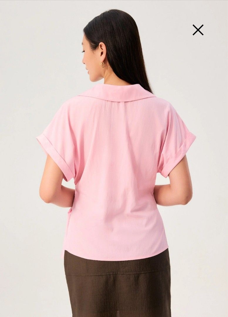 Pink Short Sleeve Wrap Tie Top (Category: Blouses) located in Manila. Submitted by mscloudnine (Listing ID 1446799523, Image 3). Description: - Cute pink wrap top - Short sleeves - Features a tie detail at the waist - Collar neckline - Perfect for dressing up or down -Cut with drop shoulders and a breathable fabric - Please check measurements for the best fit Retails for 1,990.00 Selling as low as 1,550.00 BRANDNEW with tag.