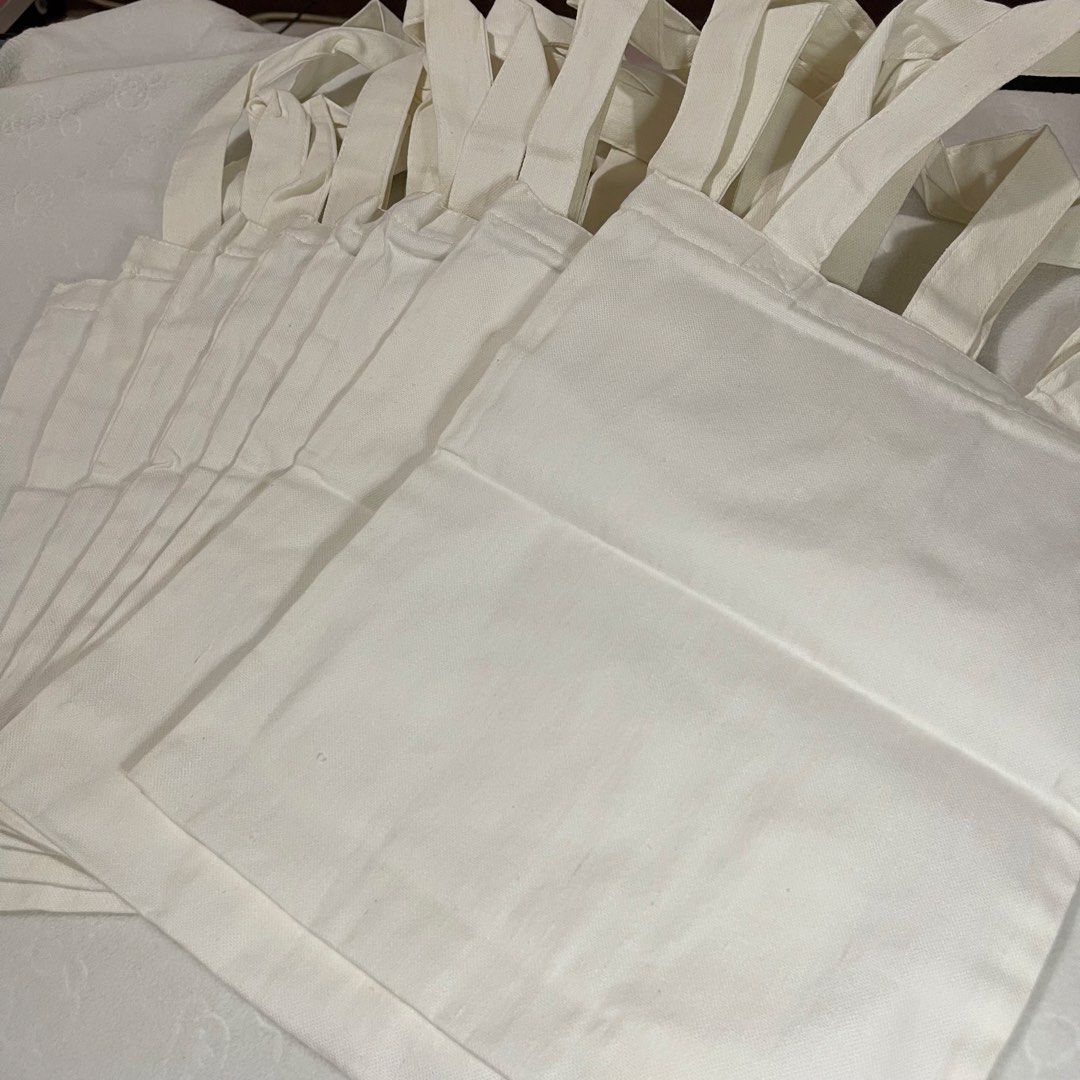 Plain White Canvas Tote Bag Katsa 8pcs Bundle (10x12 - Small) (Category: Tote Bags) located in Bulacan. Submitted by koolkart (Listing ID 1446871072, Image 2). Description: product description - 8pcs bundle (plain white canvas tote bag, 10x12) - never used, just stored - has some discoloration due to being stored for a while in a ziplock bag. not sure if washable - rfs: decluttering delivery and payment - mop: gcash - mod: j&t (sf must be shoulde