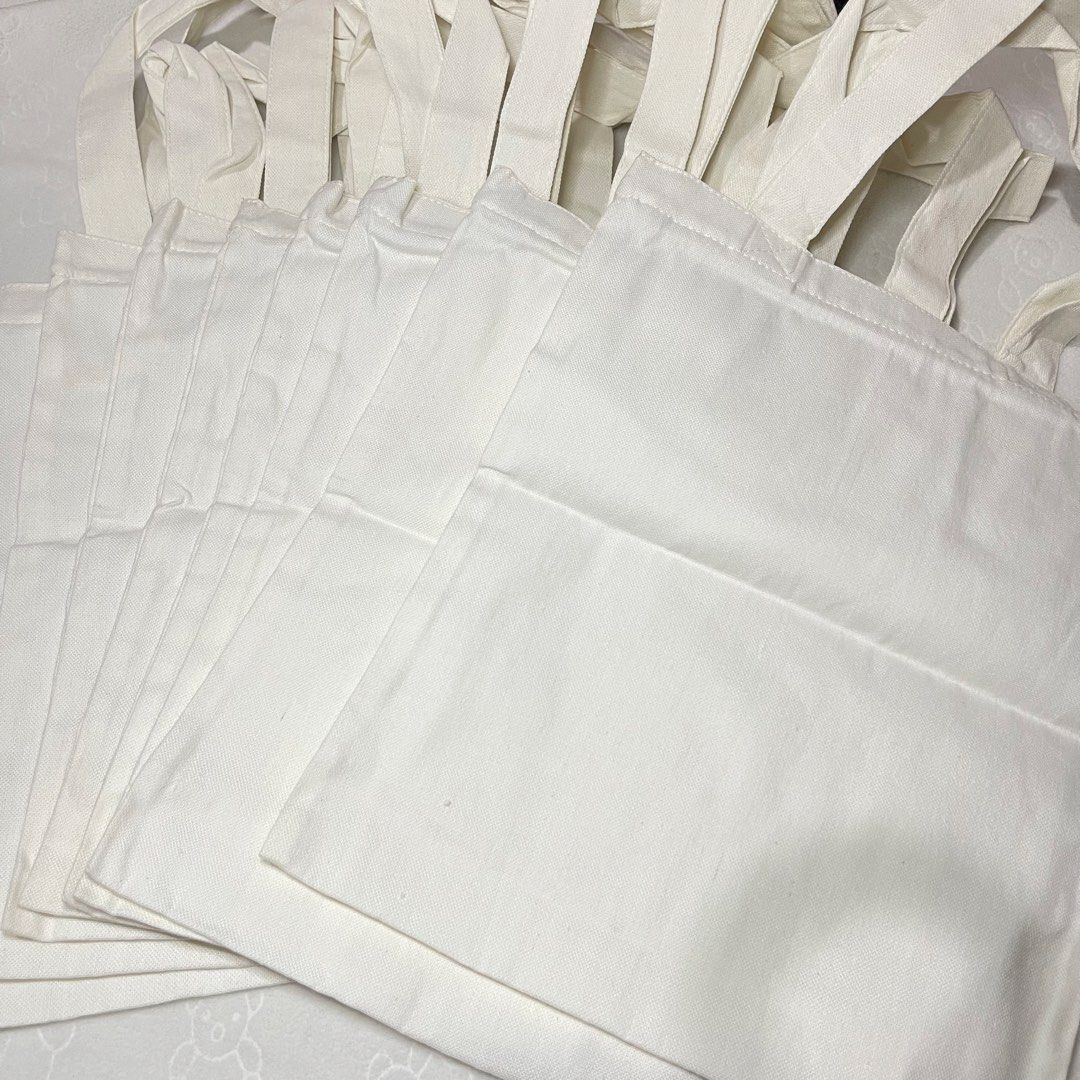 Plain White Canvas Tote Bag Katsa 8pcs Bundle (10x12 - Small) (Category: Tote Bags) located in Bulacan. Submitted by koolkart (Listing ID 1446871072, Image 1). Description: product description - 8pcs bundle (plain white canvas tote bag, 10x12) - never used, just stored - has some discoloration due to being stored for a while in a ziplock bag. not sure if washable - rfs: decluttering delivery and payment - mop: gcash - mod: j&t (sf must be shoulde
