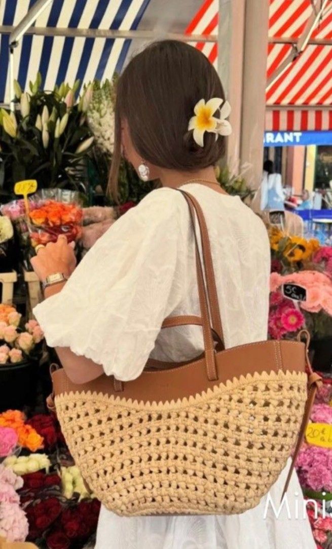 Polène Raphia (Mini) Bag -ORIGINAL (Category: Tote Bags) located in Cebu City. Submitted by kfc40 (Listing ID 1446735853, Image 3). Description: - Polène tote bag (mini size) - Woven straw body - Tan leather trim and handles - Classic, versatile design - Perfect for summer or everyday use - Includes dust bag and box -Original from Tokyo,Japan Polène store.
