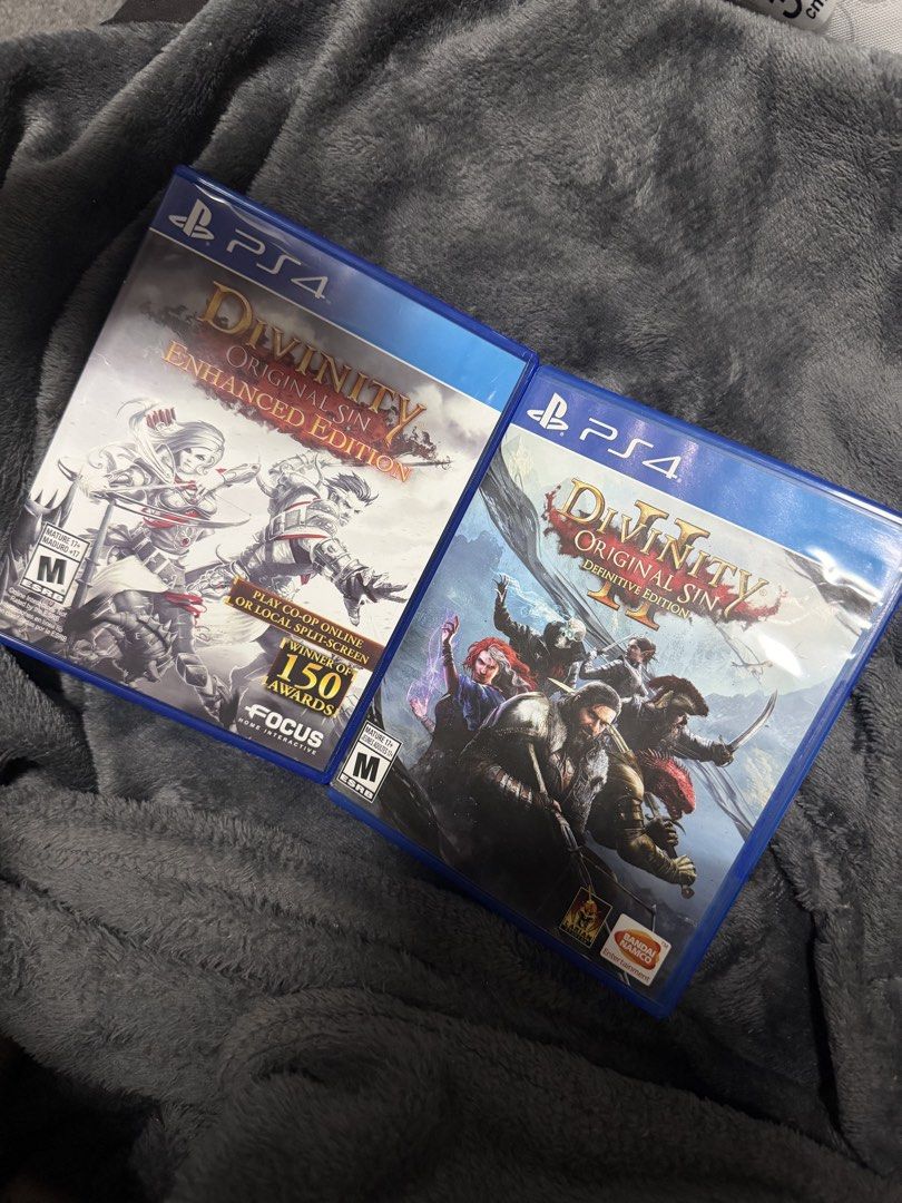 PS4 Divinity Original Sin 1 & 2 Enhanced Definitive Editions (Category: PlayStation) located in Quezon City. Submitted by dani.rojas (Listing ID 1446885852, Image 1). Description: For Sale: Divinity Original Sin 1 and 2. Tested Working Divinity Original Sin Enhanced Edition - R1 - Good Condition - 1.2k Divinity Original Sin 2 Definitive Edition - R1 - Has damage on the spine please see pic. - 1.5k Both prices are negotiable! If getting both bundl