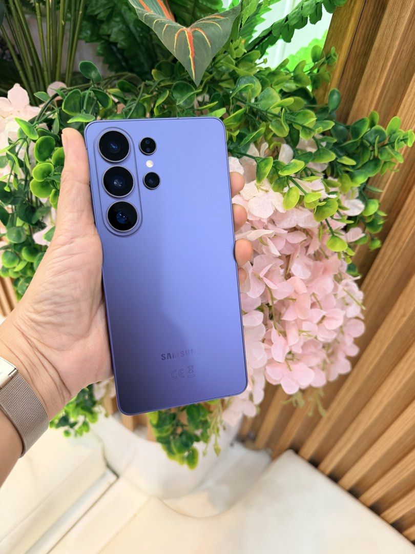 Samsung S26 Ultra Purple (Category: Cases & Sleeves) located in Bulacan. Submitted by akashoes (Listing ID 1446733887, Image 2). Description: - Samsung S26 Ultra - Stunning Cobalt Purple color - 256GB internal storage - Advanced multi-lens camera system - Vibrant and immersive display - Comes with a pink protective case featuring a ring holder - Tempered glass already installed - Openline - Available for meetup at SM City Caloocan.