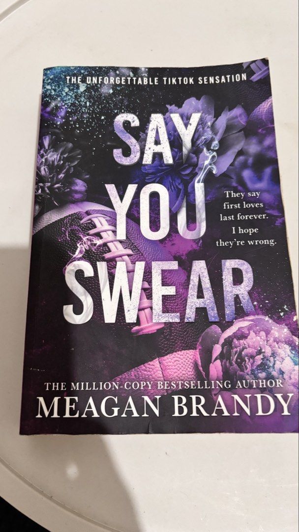 Say You Swear by Meagan Brandy (Category: Storybooks) located in Taguig. Submitted by lizzyhernandez (Listing ID 1446911641, Image 1). Description: - Unforgettable TikTok sensation - Million-copy bestselling author - A story about first loves - With tanning & creases - No highlights.