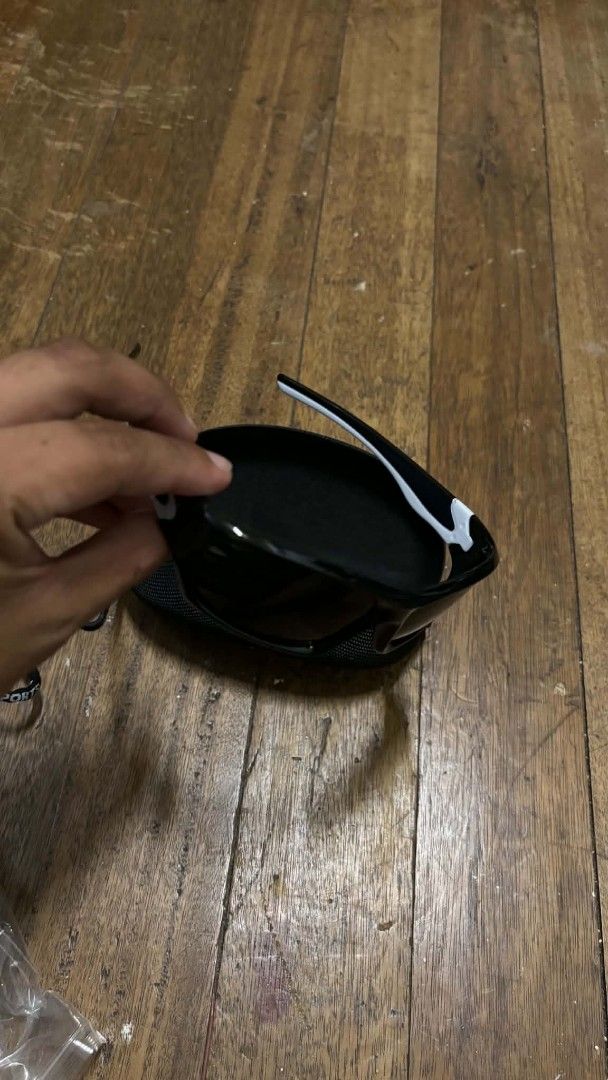 Shimano Sport Sunglasses with Case (Category: Sunglasses & Eyewear) located in Taguig. Submitted by elymalbueso (Listing ID 1446731371, Image 3). Description: - Shimano Sport Sunglasses - Black frame with white accents - Comes with a hard protective case - Tinted lenses - Ideal for cycling and outdoor activities - Ready for your next adventure.