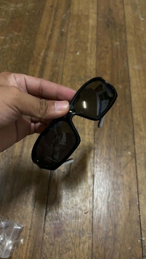 Shimano Sport Sunglasses with Case (Category: Sunglasses & Eyewear) located in Taguig. Submitted by elymalbueso (Listing ID 1446731371, Image 2). Description: - Shimano Sport Sunglasses - Black frame with white accents - Comes with a hard protective case - Tinted lenses - Ideal for cycling and outdoor activities - Ready for your next adventure.