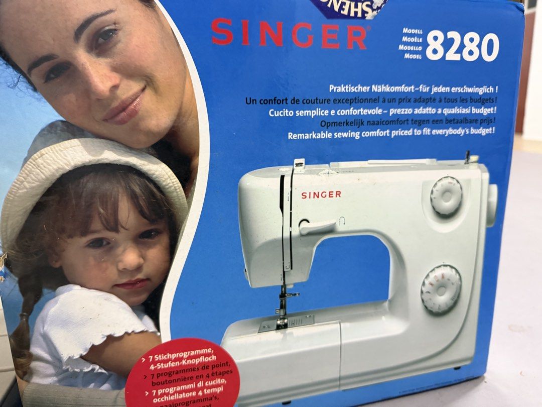 Singer 8280 Sewing Machine (Category: Craft Supplies & Tools) located in Singapore. Submitted by nnfxla (Listing ID 1446863243, Image 3). Description: Singer sewing machine, model 8280. Comes with 7 stitch programs and 4 buttonhole stitches. Great for everyday sewing needs. Easy to use. Includes accessories. Ready for your next project. Bought but never got a chance to use. Threw the box away as it was damaged, only sewing machine, dust cover.
