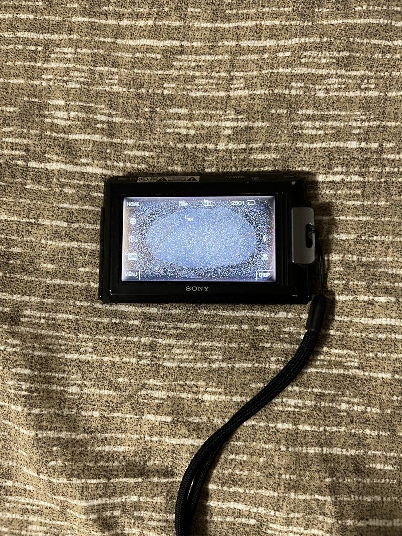 Sony t77 (Category: Cameras) located in Manila. Submitted by georgiebin05541 (Listing ID 1446846826, Image 3). Description: Sony t-77 - has lcd burn - containd sd card, sd card reader, and charger - manila area - got this for 2500.