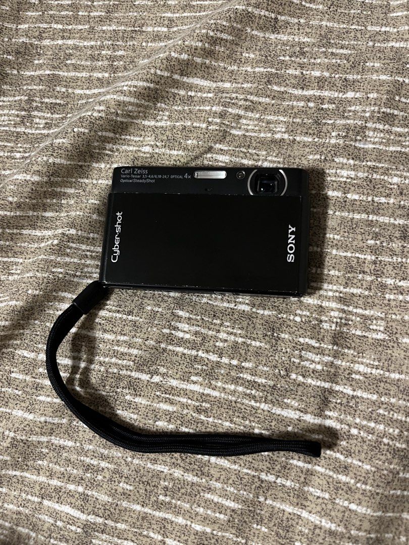 Sony t77 (Category: Cameras) located in Manila. Submitted by georgiebin05541 (Listing ID 1446846826, Image 2). Description: Sony t-77 - has lcd burn - containd sd card, sd card reader, and charger - manila area - got this for 2500.