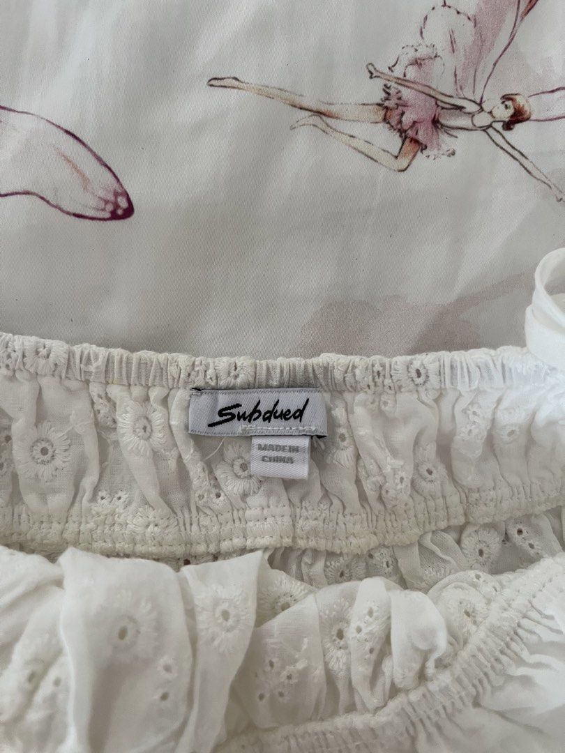 subdued white eyelet tank top (Category: Sleeveless) located in Quezon City. Submitted by avaadeclutters (Listing ID 1446804577, Image 2). Description: 💌 bought in subdued, madrid has a tiny stain that can be removed.