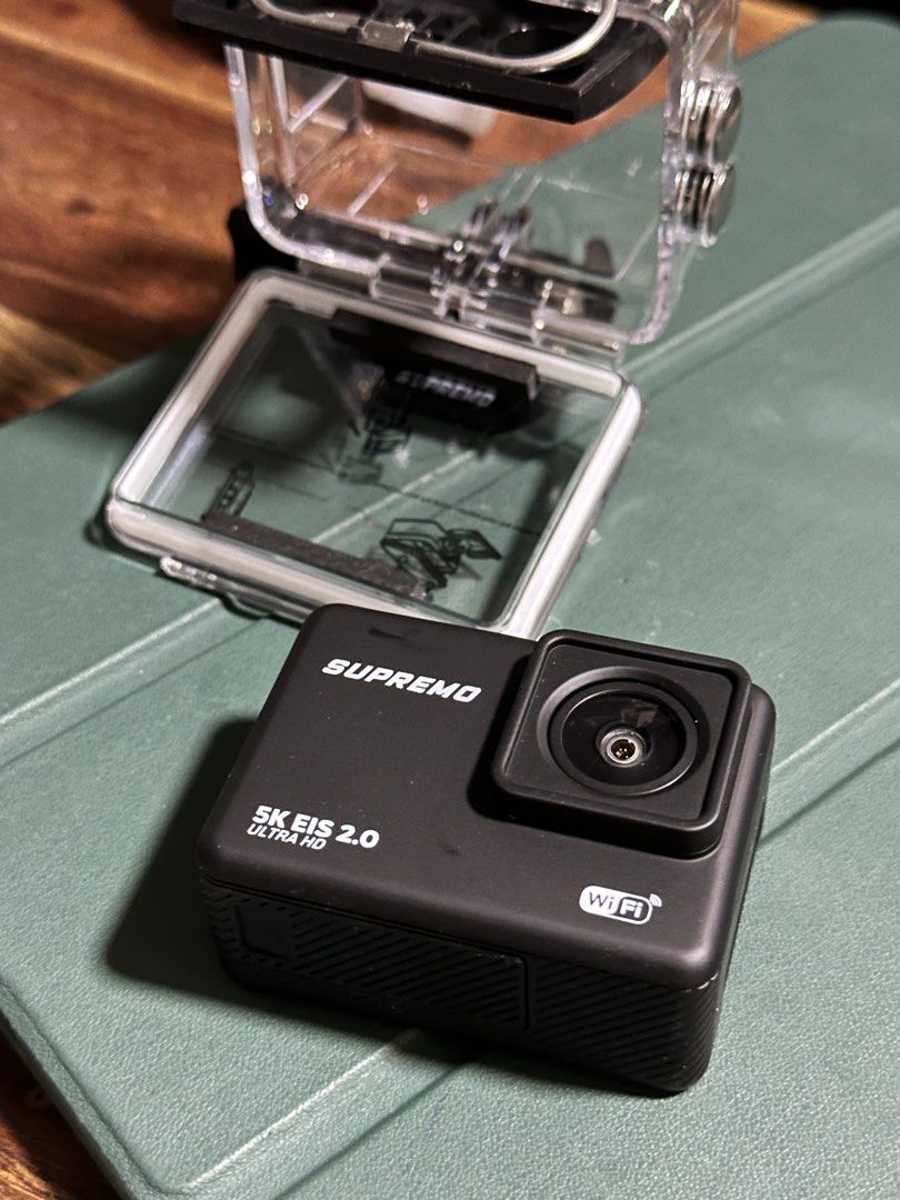 Supremo Air 5K Action Camera with Waterproof Case (Category: Cameras) located in Taguig. Submitted by engrcj (Listing ID 1446801261, Image 2). Description: NEVER USED. GOOD AS BRAND NEW. - Record stunning 5K video at 30 FPS. - Capture incredible detail with 64MP photos. - Experience smooth, stable footage with 6-axis gyroscope stabilization. - Waterproof up to 30 meters with the included case. - Easily connect and share with built-in WiFi. - Idea