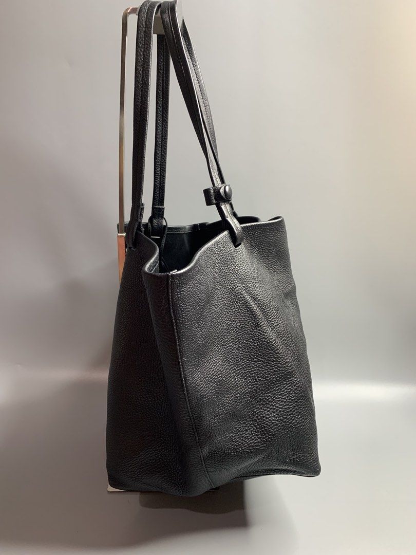 The Row Park Tote (Category: Tote Bags) located in Binan City. Submitted by disqualified_but_undefeated (Listing ID 1446877923, Image 3). Description: The Row Park Tote Bag It Comes With Wallet Pouch Womens Aprox Size Large Authentic Please Check Detailed Photos Posted For Your Reference Will add Additional Photos Or Video Upon Request Thanks!!! •The Row Park Tote, a highly sought-after, minimalist handbag celebrated for its understated luxury ae