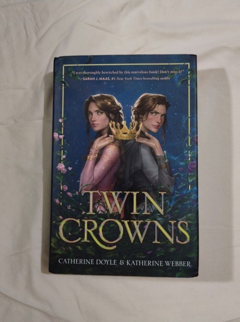 TWIN CROWNS by Catherine Doyle & Katherine Webber | Hardbound Set (LP) (Category: Storybooks) located in Manila. Submitted by declutter_w.sage (Listing ID 1446783396, Image 3). Description: - ORIGINAL, last price posted - missing the second book - strictly no breaking of set - small dents in corners - can send more photos upon request tags: booktok, fantasy, YA, Twin Crowns & Burning Crowns MOP: Maribank | Gcash (+10) 🫧.