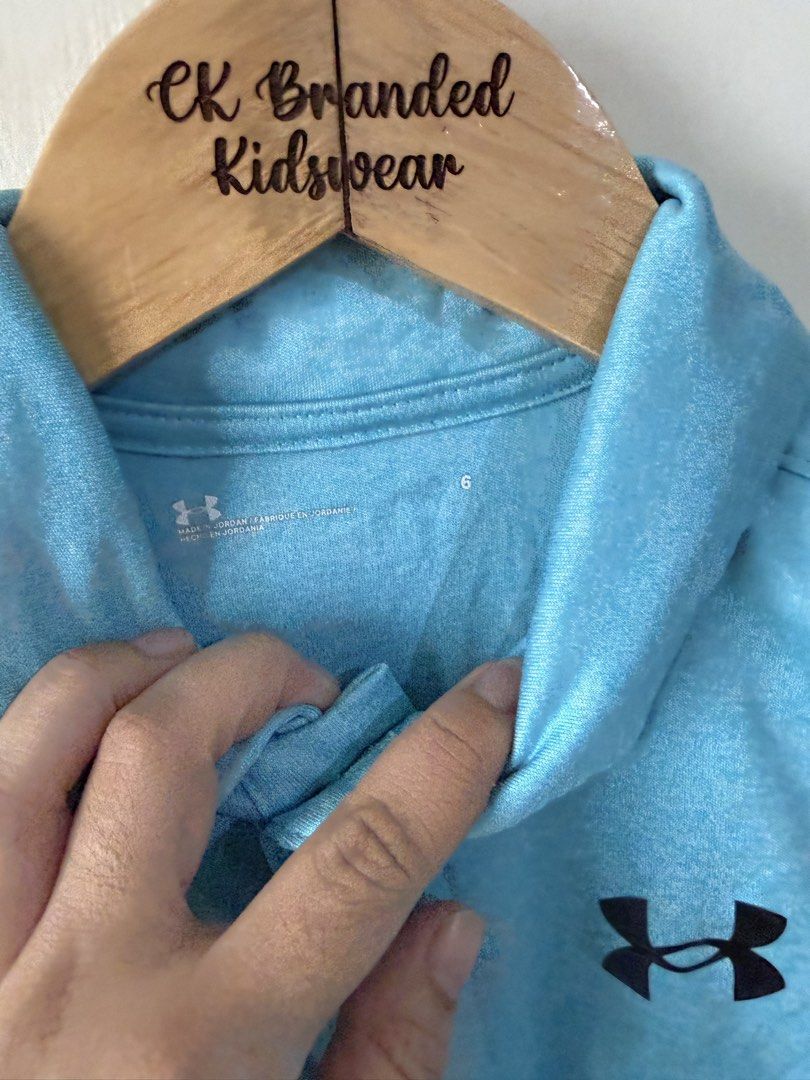 Under armour polo shirt (Category: Babies & Kids Fashion) located in Angeles City. Submitted by buyforless04 (Listing ID 1446822114, Image 2). Description: 6yo Euc.