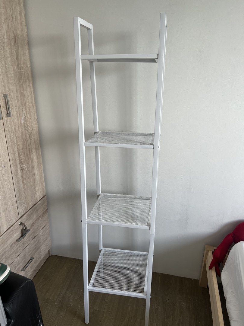 White 4-Tier Ladder Shelf (Category: Shelves, Cabinets & Racks) located in Makati City. Submitted by shujiscloset (Listing ID 1446832495, Image 1). Description: - White 4-tier ladder shelf - Perfect for storage or display - Features durable mesh shelves - Simple, versatile design fits any room - Easy to assemble.