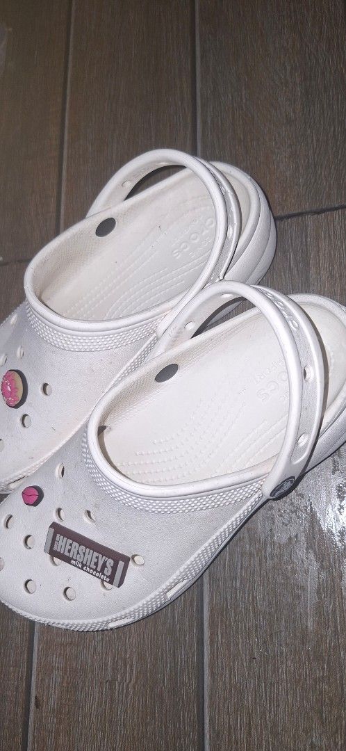 White Crocs with Hershey's and Pink Charm (Category: Slippers and slides) located in Valenzuela. Submitted by thriftlets (Listing ID 1446744092, Image 2). Description: authentic crocs size w8 original jibbitz from crocs rfs: decluttering.