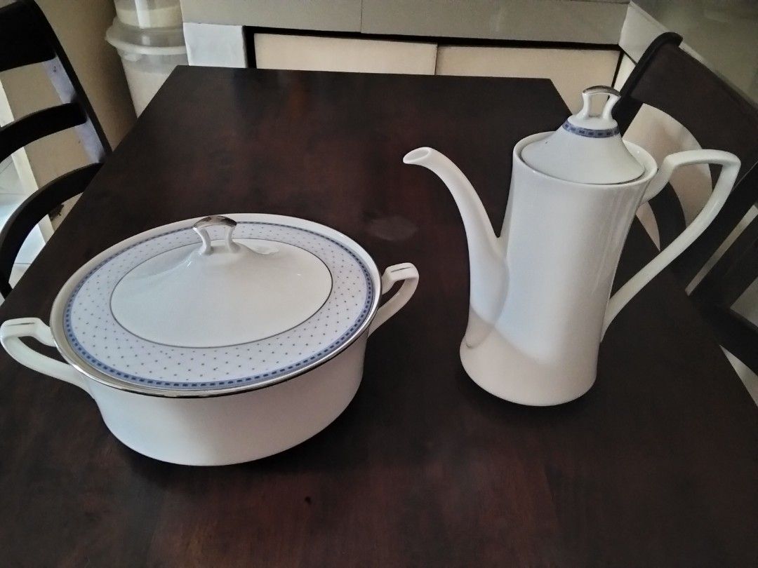 White Porcelain Casserole Dish and Coffee Pot with Blue Pattern (Category: Dinnerware & Cutlery) located in Antipolo. Submitted by olayerm1213 (Listing ID 1446743751, Image 1). Description: - White porcelain casserole dish with lid - Matching tall, elegant coffee pot - Delicate blue dotted pattern on rims and accents - Casserole dish features convenient side handles - Coffee pot has a curved spout and comfortable handle - Ideal for both serving g