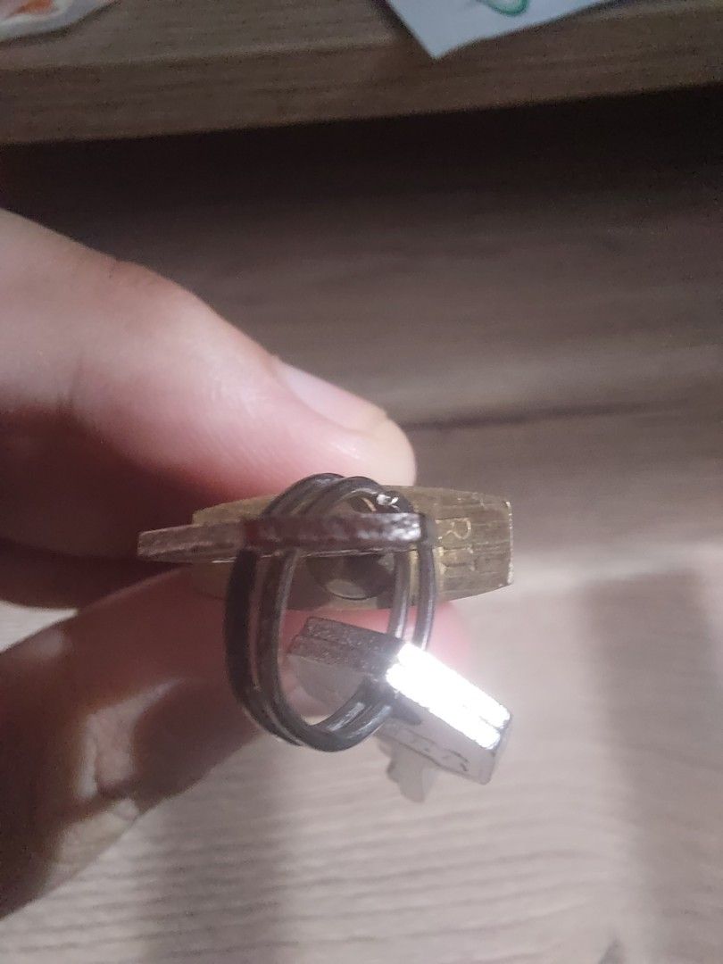 YETI Golden Lock with Key (Category: Luxury Accessories) located in Malaybalay. Submitted by mags_sofia (Listing ID 1446831192, Image 2). Description: - golden lock - Features a key with a black band - Perfect lock for travel.