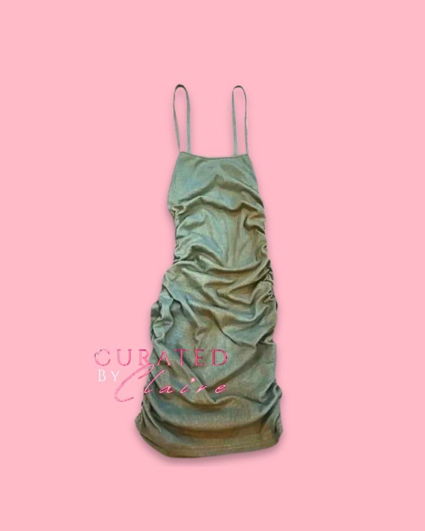 013 // THE MOSS GREEN RUCHED BODYCON (Category: Dresses) located in Taguig. Submitted by curatedbyclairemnl (Listing ID 1441817417, Image 1). Description: 013 // THE MOSS GREEN RUCHED BODYCON PRODUCT DETAILS: This moss green mini dress is made of a high-stretch ribbed material featuring spaghetti straps and side-ruched detailing throughout. Condition: Lightly used Size: • Width (Unstretched): 8.5” • Width (Fully Stretched): 15” • Length: 24.5” PR