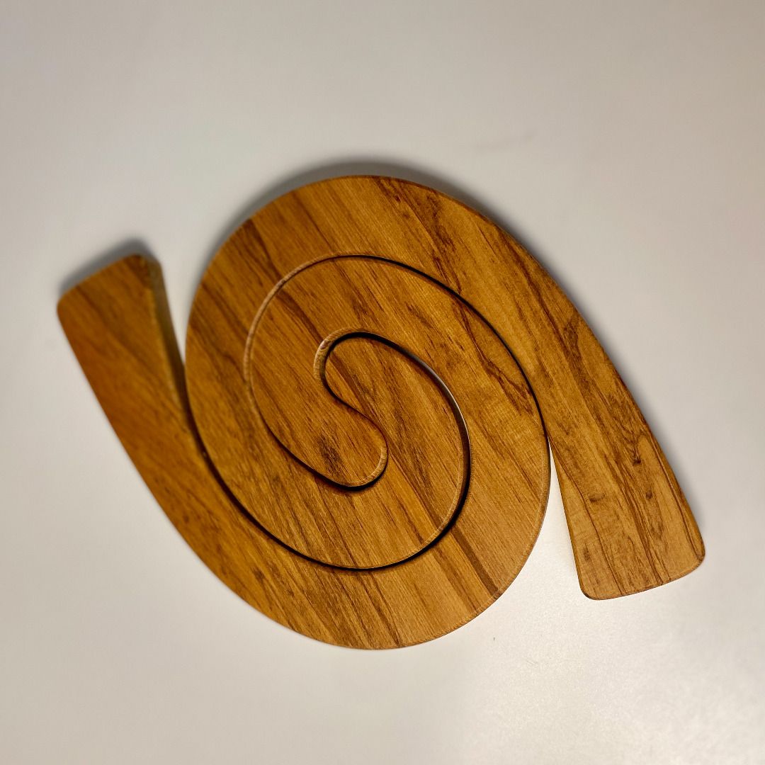 052626-057 Handcrafted Wooden Table Mat (Category: Tables & Sets) located in Quezon City. Submitted by madiscollectibles (Listing ID 1441812600, Image 2). Description: - Set of wooden table mats - Unique spiral design - Made by Rattan Woodcrafts - Comes in original packaging - Protects table surfaces with a stylish touch - Adds a natural element to your dining setting - Suitable for everyday use or special occasions.