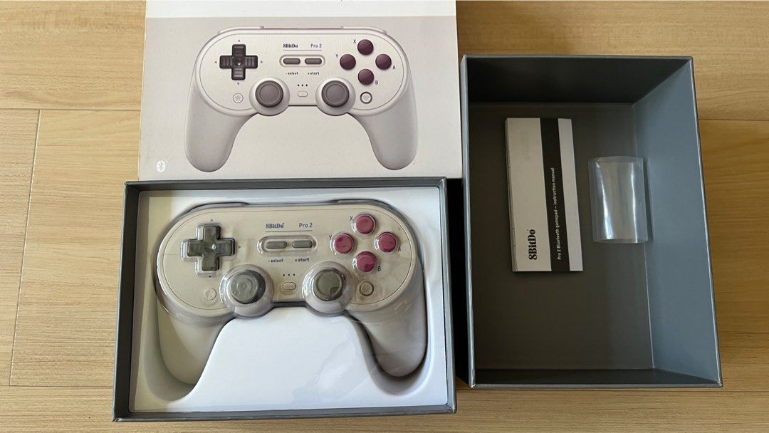 8BitDo Pro 2 Elite Controller (Category: Controllers) located in Singapore. Submitted by lonkcarrou (Listing ID 1441843994, Image 1). Description: Firmware updated. 1 white; 1 black $46 for one; $85 for two. these are the models always sold out in the local game shops. - Compatible with PC, Mac, Nintendo Switch, Xbox. Programmable. - Comes with original packaging - Please check the pictures for the condition. no exchange or refund..