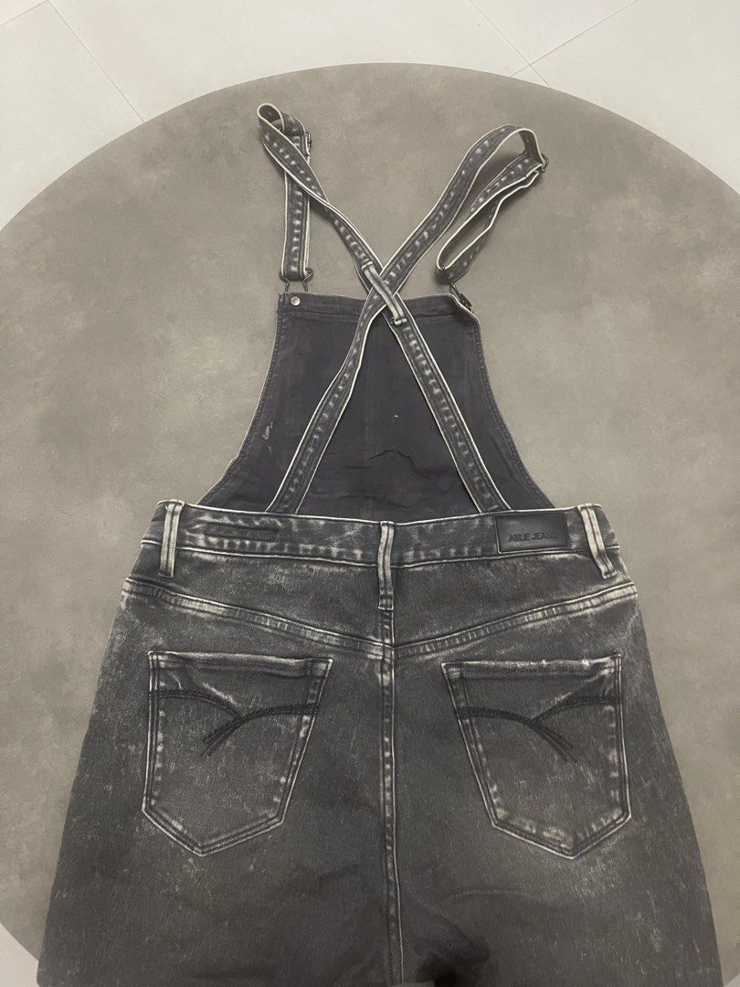 ABLE JEANS Grey Denim Distressed Overalls, Jumper (Category: Jumpsuits) located in Lucena. Submitted by halfrackph (Listing ID 1441900788, Image 3). Description: - ABLE JEANS grey denim short overalls - Size 26 - Distressed details on front and back - Adjustable straps - Perfect for a casual, edgy look - Pairs well with t-shirts or crop tops.