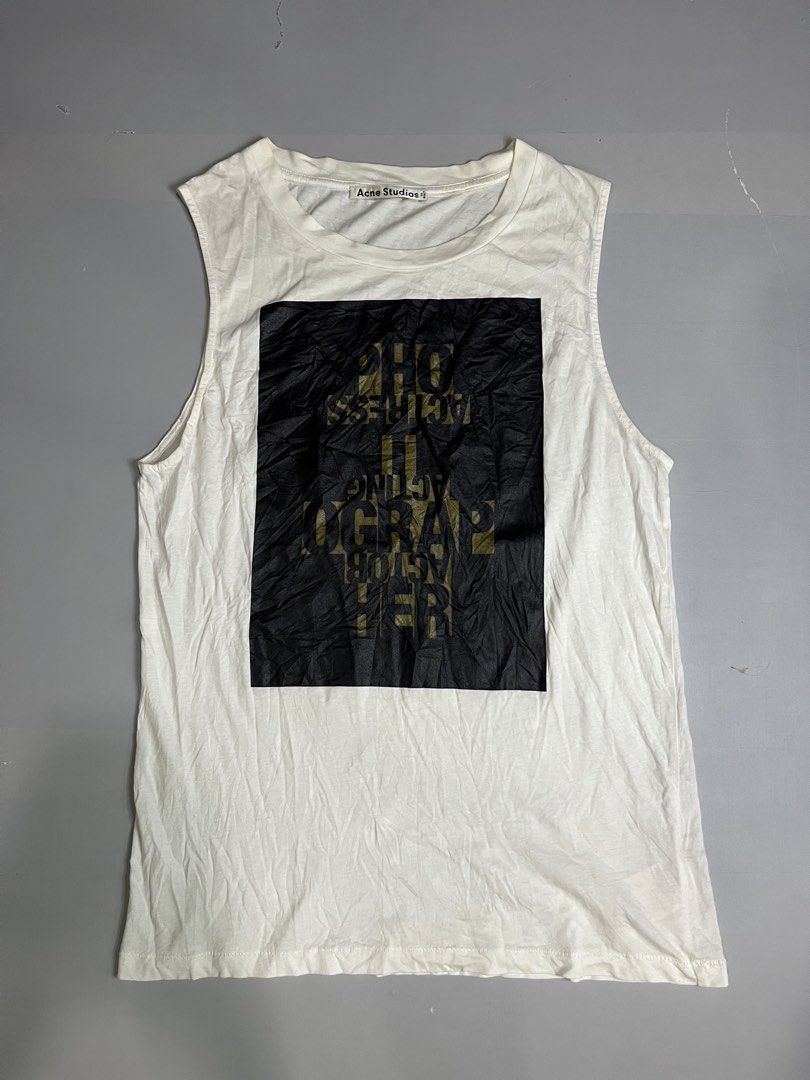 Acne Studios White Graphic Print Tank Top (Category: Sleeveless) located in Mabalacat. Submitted by aas_thriftfings (Listing ID 1441807653, Image 1). Description: - Acne Studios tank top - Black graphic print with gold text - Sleeveless design - Made in Portugal - Ideal for casual wear.