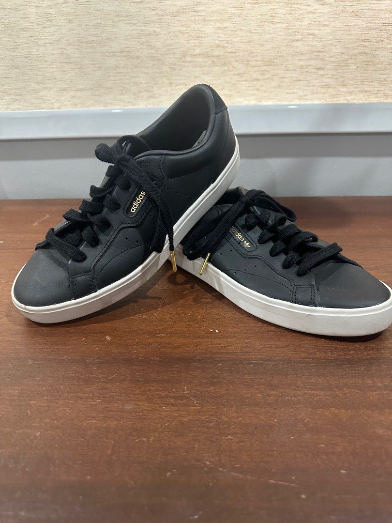 Adidas Ladies Leather Sneakers (Category: Sneakers) located in Makati City. Submitted by i_am_spring87 (Listing ID 1441864871, Image 1). Description: 100% authentic Black leather Adidas sneakers with gold tip shoe lace Only worn 3x .