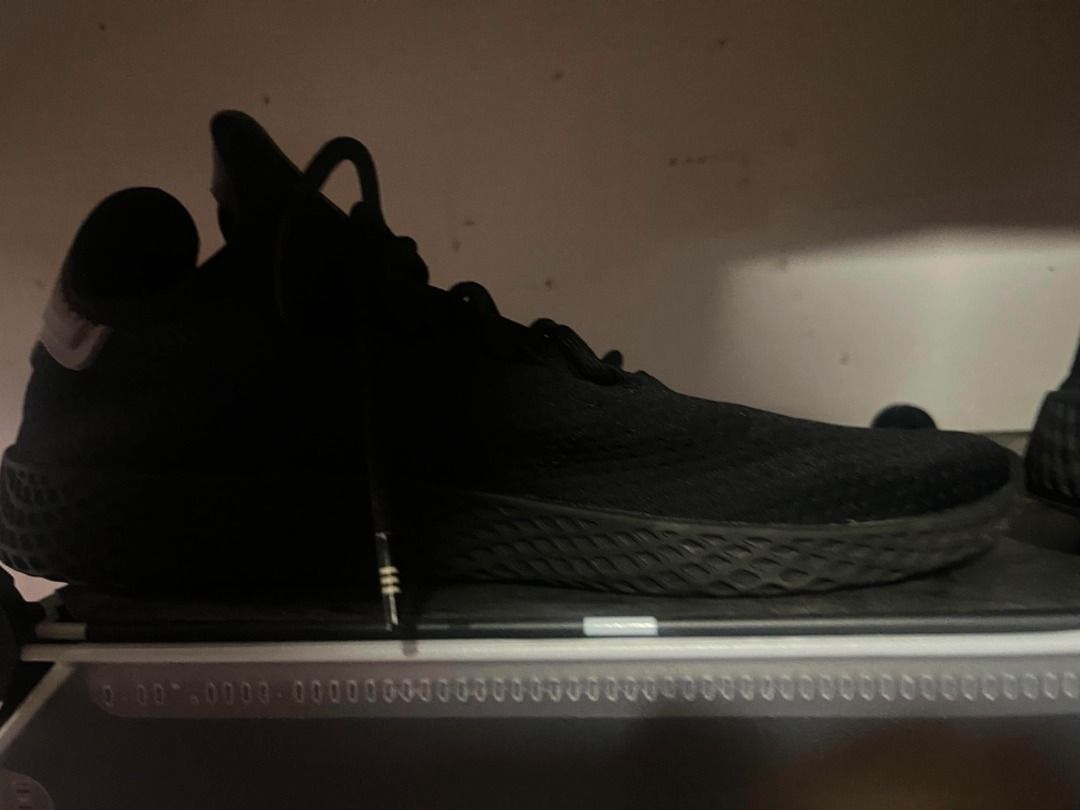 adidas x Pharrell Tennis Hu (Category: Sneakers) located in Caloocan City. Submitted by zealmountain.9b30cf (Listing ID 1441859516, Image 2). Description: - Authentic Black Adidas Pharrell Williams Hu NMD sneakers - Classic and versatile black colorway - Designed for ultimate comfort and everyday style - A highly sought-after addition to any sneaker collection - Don't miss out on these popular kicks!.