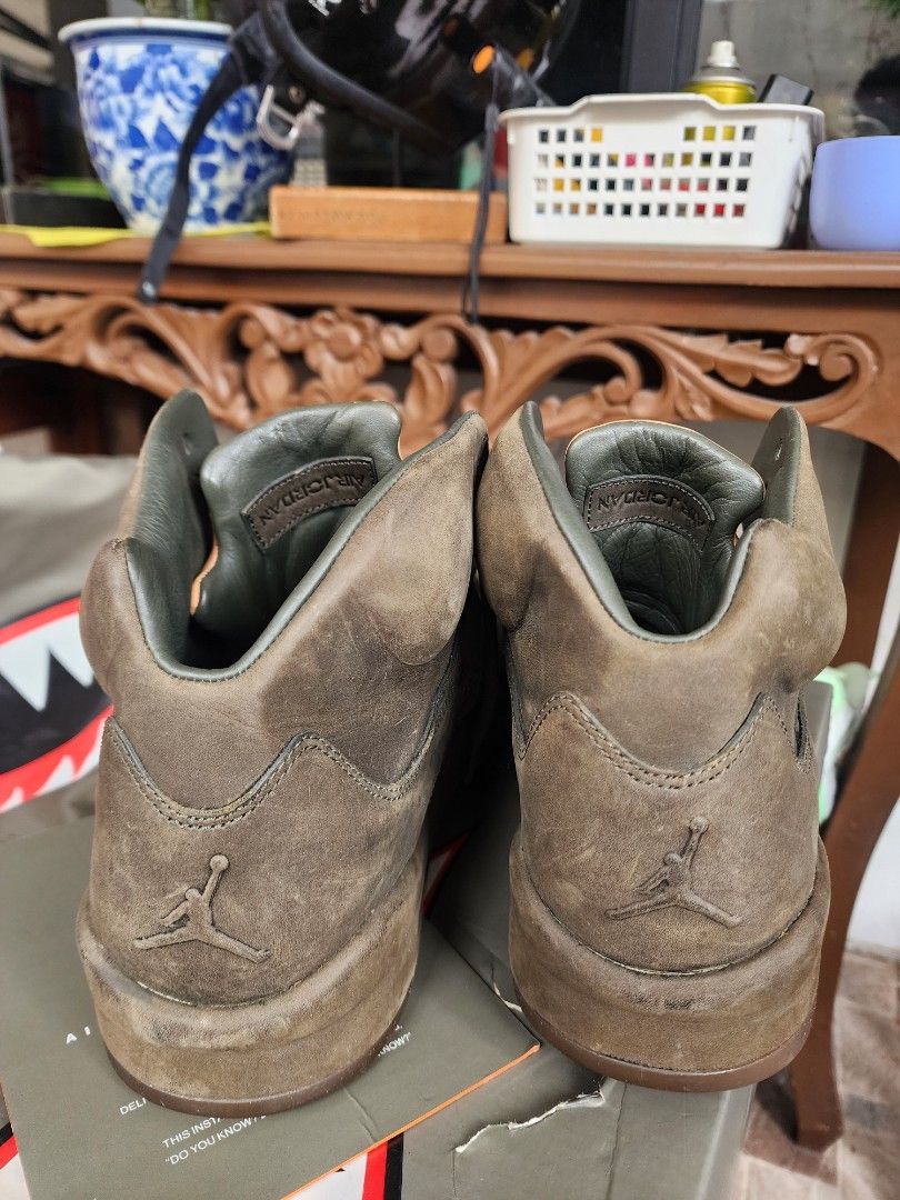 Air Jordan 5 Retro Olive (Category: Sneakers) located in Pasig City. Submitted by rolokim (Listing ID 1441791459, Image 3). Description: Air Jordan 5 Premium "Take Flight" 🪖 Dark Stucco / Sequoia / Vachetta Tan 📦 OG Box ✅ | Dustbag ✅ | Insert Card ✅ 👟 Size: US 11 Used condition — visible wear on uppers and sole, normal for its age. Gum sole still solid, no separation. Asking: Make an offer! 💬 This is the Premium version — full leather constru