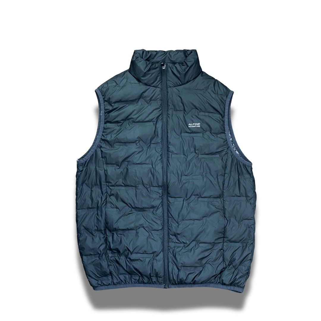 Alpine Adventures Down Puffer Vest (Category: Vests) located in Valenzuela. Submitted by aplusmnl (Listing ID 1441961852, Image 3). Description: Width 22 Length 25 - Lightweight puffer vest from Alpine Adventures - Ideal for layering - Features a stylish patterned lining - Full zip front with a stand-up collar - Sleeveless design for unrestricted movement - Perfect for cooler weather.