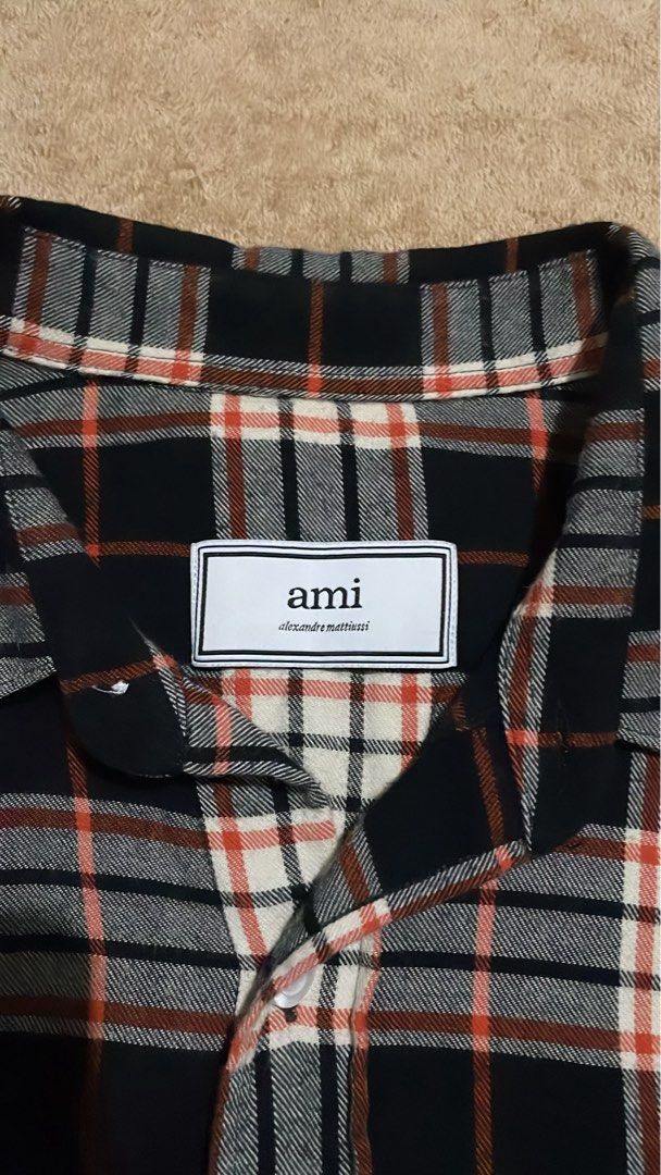 AMI Alexandre Mattiussi Plaid Shirt (Category: Tshirts & Polo Shirts ) located in Cebu City. Submitted by johnova18 (Listing ID 1441966308, Image 2). Description: Ami Paris Plaid Flannel Button Down LS Authentic ✅ Size: Medium(37 on tag) Width: 19.5 Length: 27.5 Color rate: 10/10 Pristine condition Good As New 3000 + shipping fee Location: Cebu City.