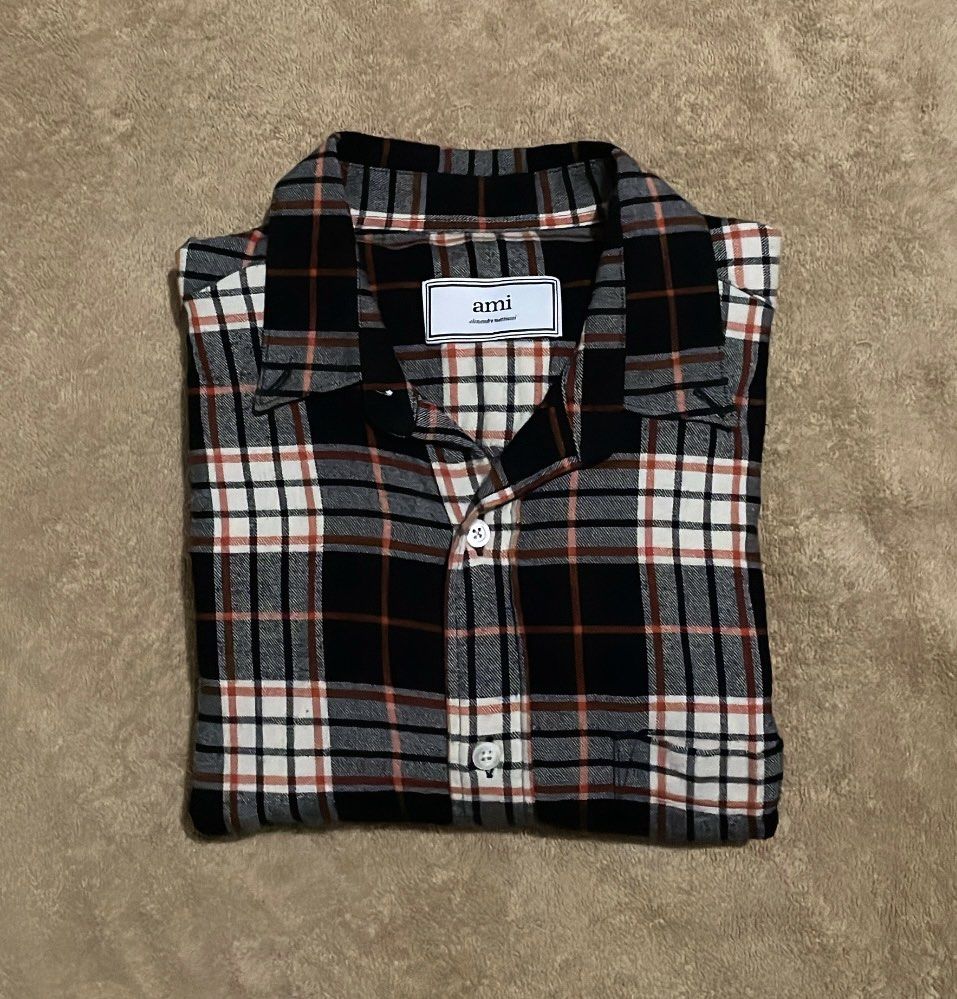 AMI Alexandre Mattiussi Plaid Shirt (Category: Tshirts & Polo Shirts ) located in Cebu City. Submitted by johnova18 (Listing ID 1441966308, Image 1). Description: Ami Paris Plaid Flannel Button Down LS Authentic ✅ Size: Medium(37 on tag) Width: 19.5 Length: 27.5 Color rate: 10/10 Pristine condition Good As New 3000 + shipping fee Location: Cebu City.