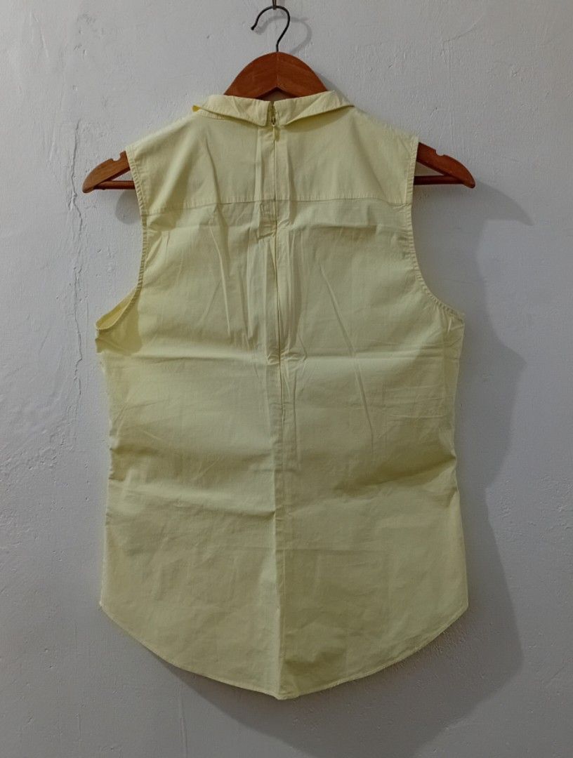 Armani Exchange Sleeveless Collared Top M/M Yellow (Category: Sleeveless) located in Navotas City. Submitted by ms.soulana (Listing ID 1441830106, Image 3). Description: PREOWNED LikeNew Lightly Used Authentic ARMANI EXCHANGE BABY COLLAR YELLOW TOPS YELLOW SMALL -MEDIUM Good Condition 9/10.