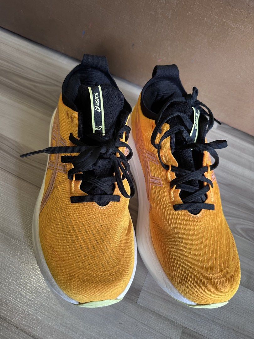 ASICS GEL-NIMBUS 27 Yellow Running Shoes (Category: Sneakers) located in Singapore. Submitted by dao0407 (Listing ID 1441925357, Image 2). Description: - ASICS GEL-NIMBUS 27 Running Shoes - Color: Yellow with black laces/interior and white sole with yellow accents - Condition: like new, wear 3 times only - Versatile: Perfect for running or everyday wear.