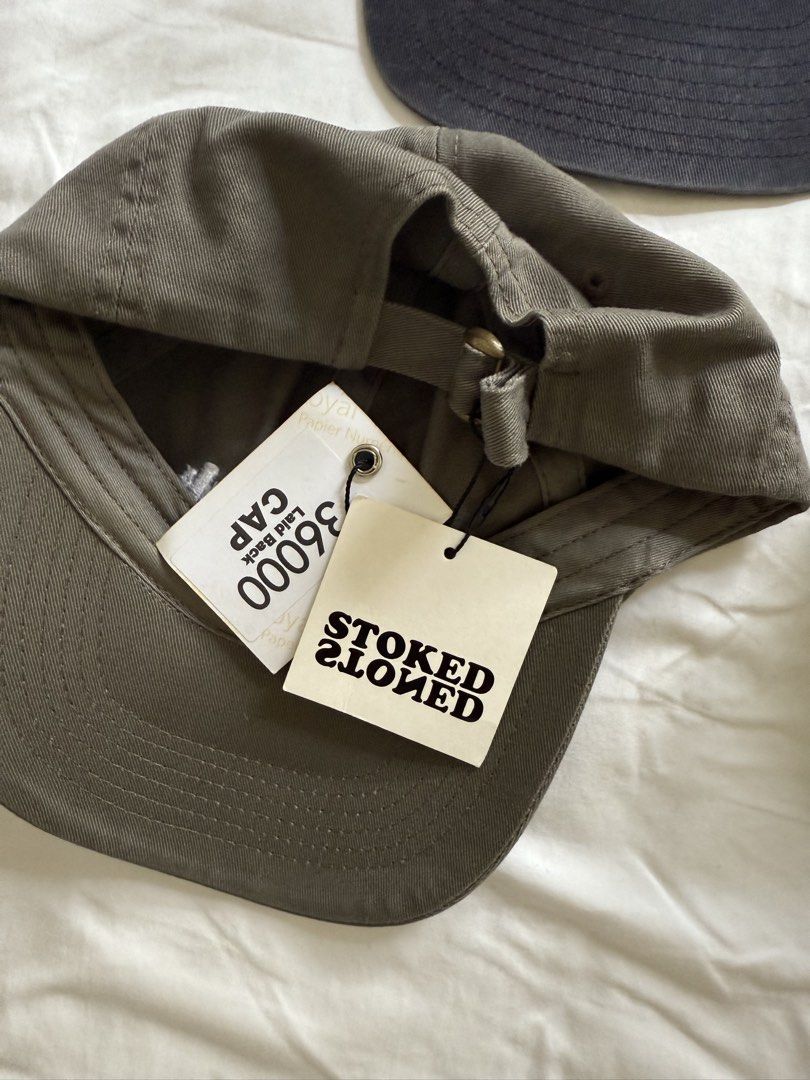 Assorted Caps (Category: Caps & Hats) located in Singapore. Submitted by ovovovo (Listing ID 1441817601, Image 3). Description: $10 each except for Air Jordan vintage wash $30 Caterpilla trucker cap, COS short tongue cap , Stoked & Stone BNWT Laid Back cap.