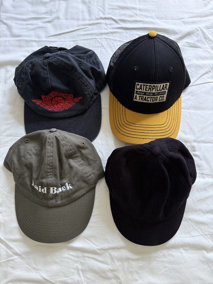 Assorted Caps (Category: Caps & Hats) located in Singapore. Submitted by ovovovo (Listing ID 1441817601, Image 1). Description: $10 each except for Air Jordan vintage wash $30 Caterpilla trucker cap, COS short tongue cap , Stoked & Stone BNWT Laid Back cap.