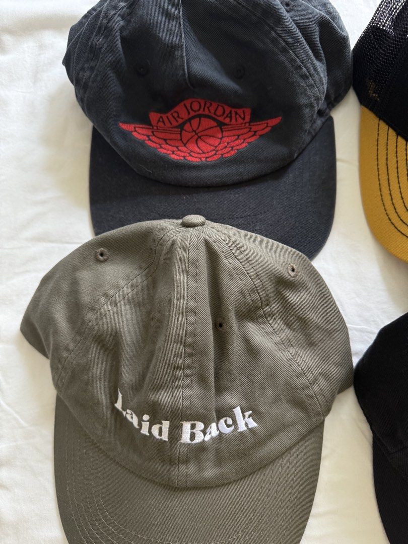 Assorted Caps (Category: Caps & Hats) located in Singapore. Submitted by ovovovo (Listing ID 1441817601, Image 2). Description: $10 each except for Air Jordan vintage wash $30 Caterpilla trucker cap, COS short tongue cap , Stoked & Stone BNWT Laid Back cap.