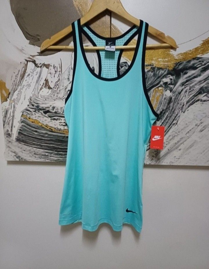 AUTHENTIC NIKE RACER BACK TANK TOP,Original Price Php3,200 (Category: Activewear) located in Magalang. Submitted by itskate_cc (Listing ID 1441903333, Image 2). Description: Actual size using inches Armpit to Armpit/179 Lenght/28 fittings is Large Excellent Condition, Issue:0 Message if you have any other question about sizing. We do shipping nation wide I'm also open for video call so that you can see the item you 're interested to buy. Courier,