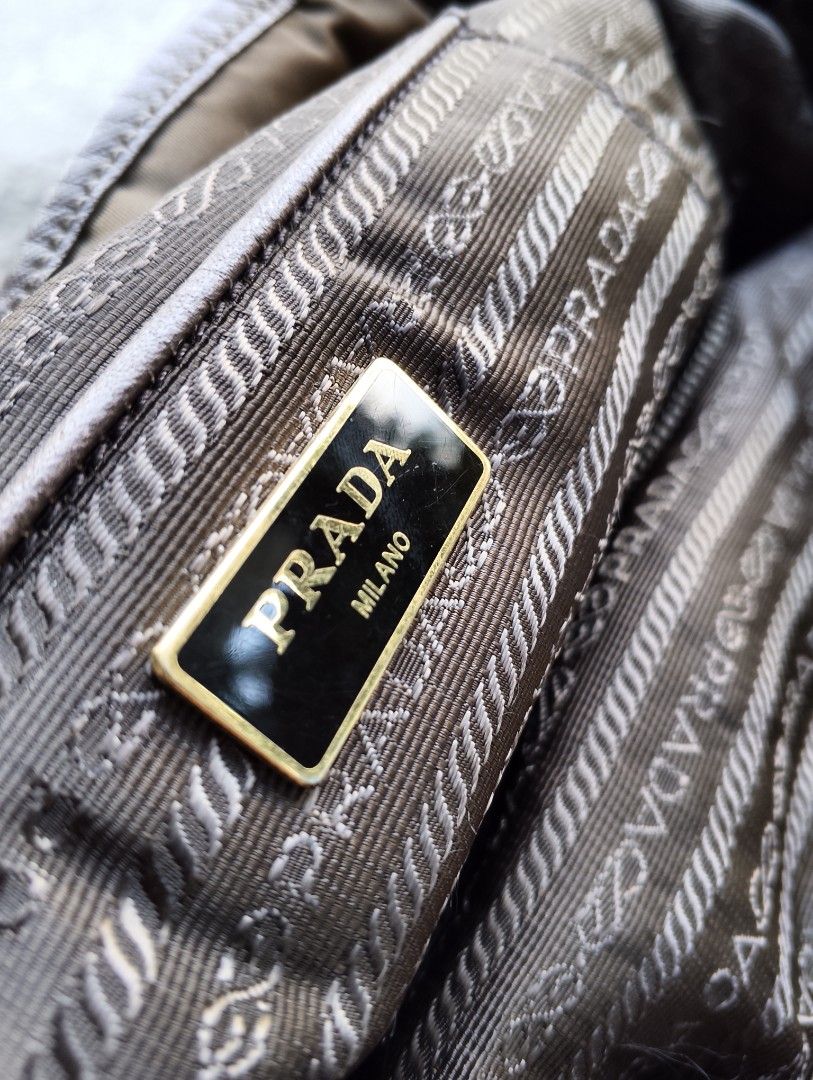Authentic Prada Tessuto Nylon Saffiano Leather Tote (Category: Luxury Bags & Wallets) located in Puerto Galera. Submitted by gentleflower-a3a1 (Listing ID 1441920845, Image 3). Description: 👜 Authentic Prada Tessuto Nylon Saffiano Leather Tote 💰 SALE PRICE: ₱8,000 ONLY 🎉 From ₱13,500 to ₱8,000 pesos ONLY!! ✔ Authentic Prada ✔ Good overall condition ✔ Spacious and perfect for everyday use ✔ Actual photos posted 📍 Location: Puerto Galera, Orien