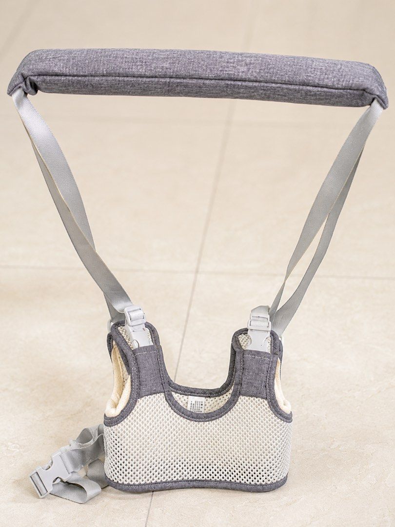 Baby Walker Harness with Handle and Straps (Category: Infant Playtime) located in Manila. Submitted by ef642543 (Listing ID 1441875358, Image 1). Description: - Helps your little one learn to walk with confidence. - Padded bar for comfortable holding. - Adjustable straps for a secure and customized fit. - Breathable mesh design keeps baby cool and comfortable. - Ideal for supporting first steps..