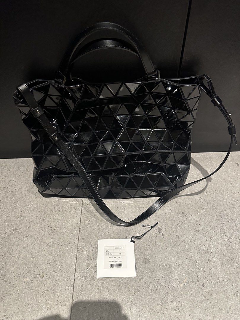 Bao Bao Issey Miyake Lucent Tote Bag Black (Category: Tote Bags) located in Quezon City. Submitted by nix888 (Listing ID 1441914404, Image 1). Description: Store bought in Japan last 2016. Excellent condition. Used not more than five times. Waterproof, lightweight and spacious enought to fit all the daily essentials. With short top handle and adjustable detachable shoulder strap. Comes with authenticity card. Price is slightly negotiable. .