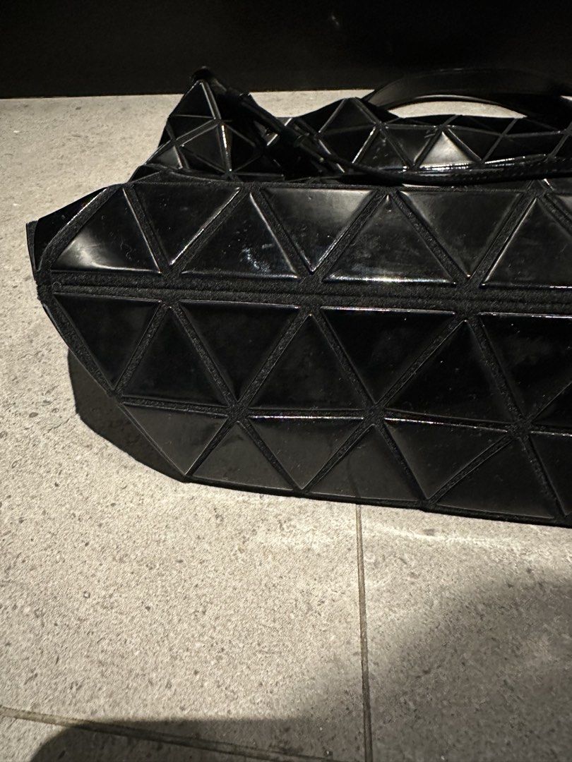 Bao Bao Issey Miyake Lucent Tote Bag Black (Category: Tote Bags) located in Quezon City. Submitted by nix888 (Listing ID 1441914404, Image 2). Description: Store bought in Japan last 2016. Excellent condition. Used not more than five times. Waterproof, lightweight and spacious enought to fit all the daily essentials. With short top handle and adjustable detachable shoulder strap. Comes with authenticity card. Price is slightly negotiable. .