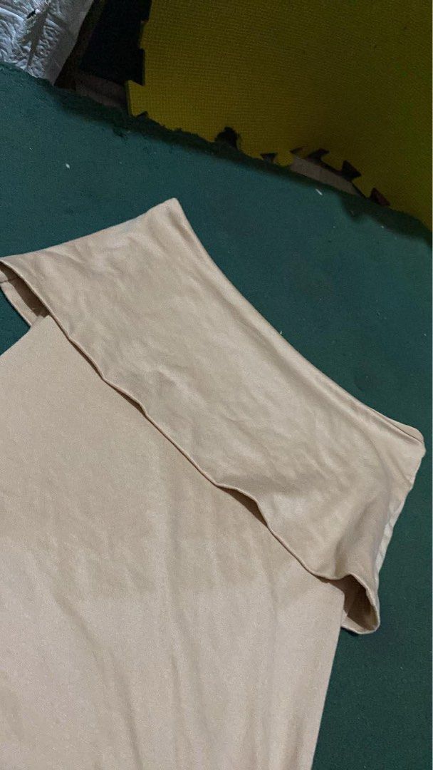 Beige Off-Shoulder Tube Top (Category: Others Tops) located in Manila. Submitted by andy.cc (Listing ID 1441907040, Image 2). Description: Simple beige tube top. Off-shoulder design with a ruffled band at the top. Stretchy material. Good condition .