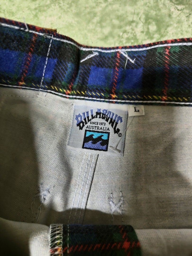 Billabong Australia Plaid Pants Size L (Category: Jeans) located in Isulan. Submitted by jaysthrift (Listing ID 1441873891, Image 2). Description: - Billabong Australia Plaid Pants - Size: Large (L) - Color: Blue, green, and brown plaid pattern - Closure: Button fly - Pockets: Two front, two back - Style: Casual, perfect for everyday wear - Condition: Please check photos for details.