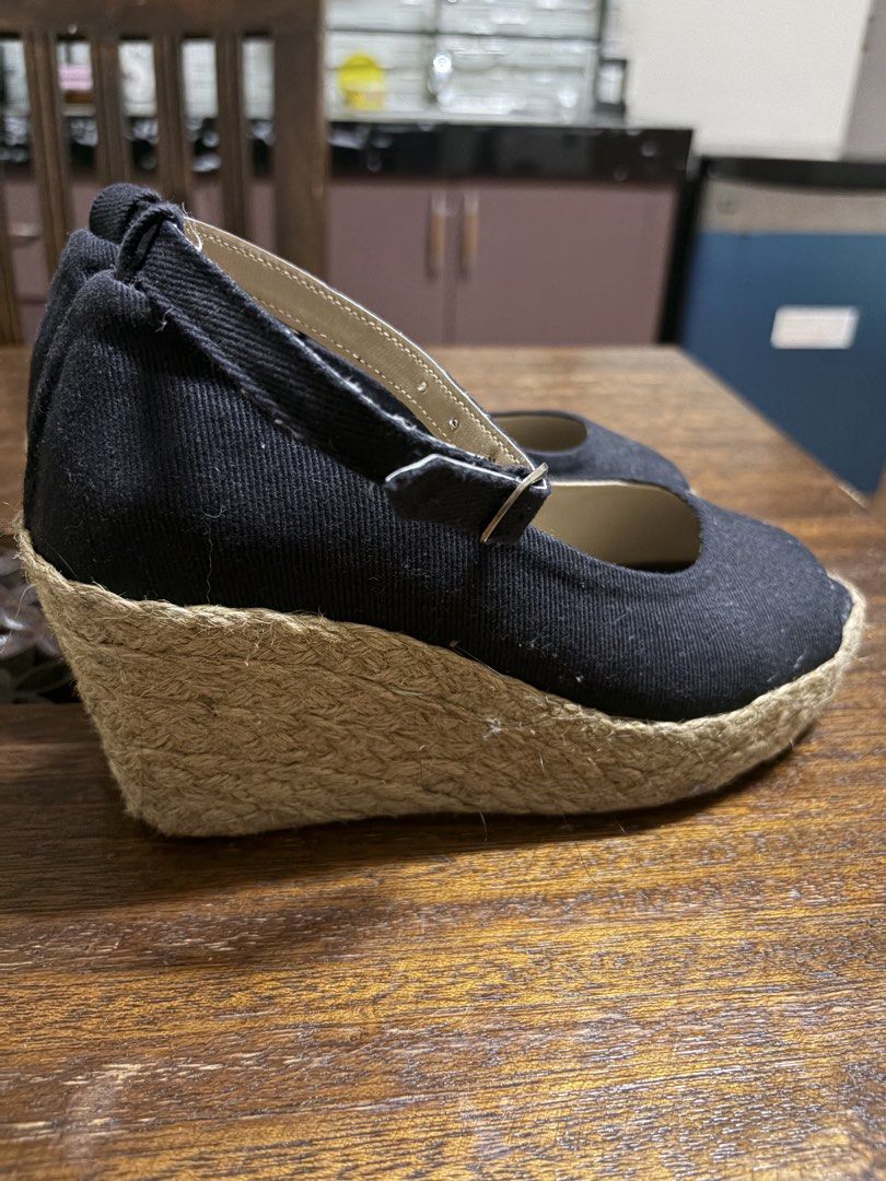 Black Espadrille Wedge Sandals with Ankle Strap (Category: Wedges) located in Manila. Submitted by ppurrrple__ (Listing ID 1441840655, Image 2). Description: - Black canvas peep-toe wedge sandals - Classic espadrille sole - Adjustable ankle strap for a secure fit - Comfortable and stylish for everyday wear - Versatile for dressing up or down NEGOTIABLE FOR SURE BUYER.